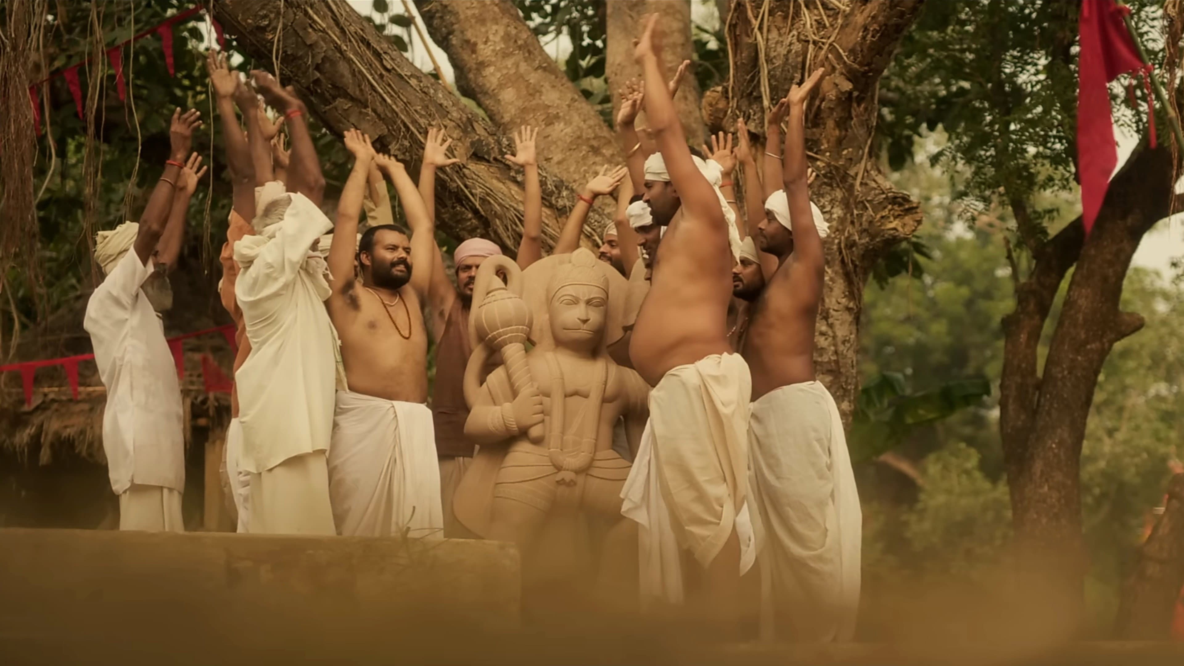 Poster for Hanuman Ansh featuring devotional imagery and a crowded cinema audience